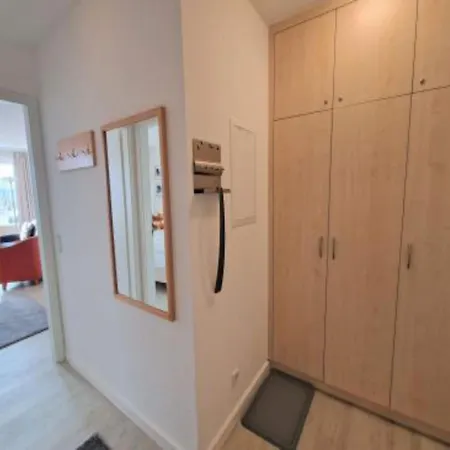 Mit Balkon Und Fitnessbereich In